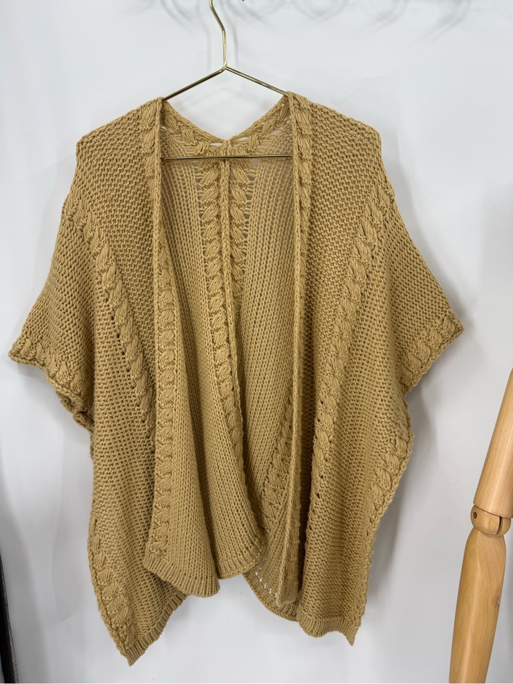 Lightweight open-front poncho cardigan in a warm camel tone. OS